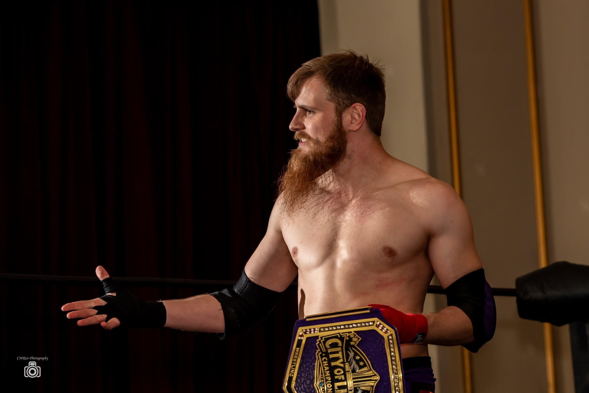 Zeak Gallent holding the City of Lights Championship at Vendetta at the Opera House